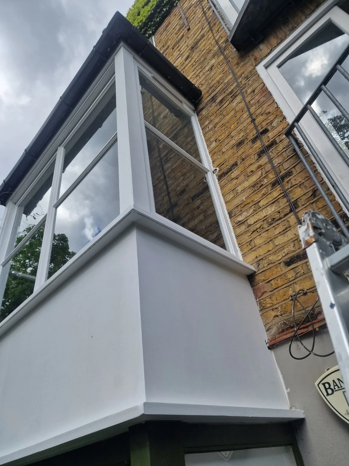 Painted bay window exterior woodwork
