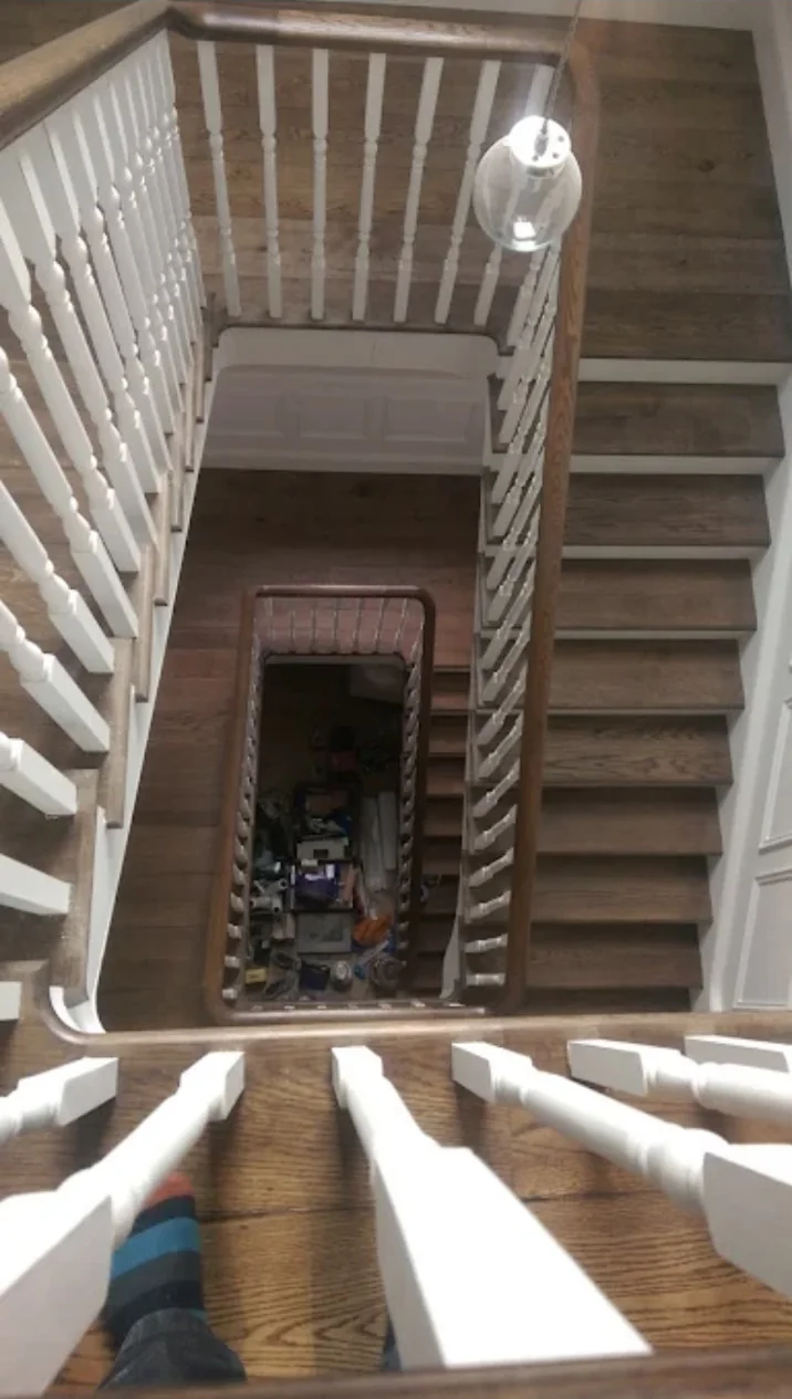 High-end staircase decorating and detailed woodwork